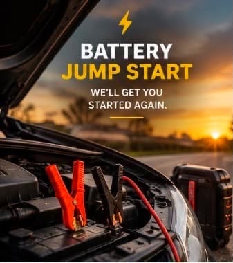 Red and black jumper clamps connected to a car battery under an open hood, with a portable jump pack on the bumper.